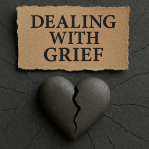 Broken heart and torn paper with "Dealing with Grief" text on cracked dark background.